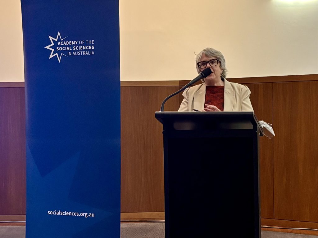 Woman at lectern